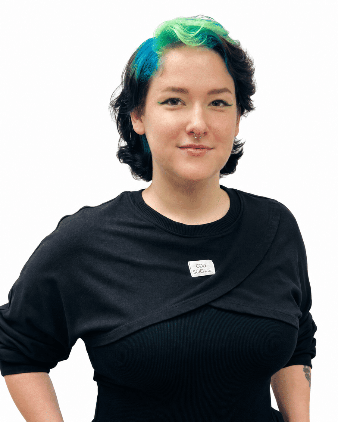 Person with green-blue hair and neutral expression, wearing a black top, against white background.